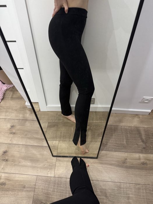 Spodnie czarne prążek rozcięcia na dole wysoki stan