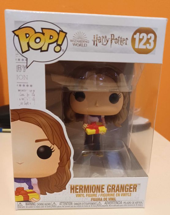 Funko Pop Hermione holding gift