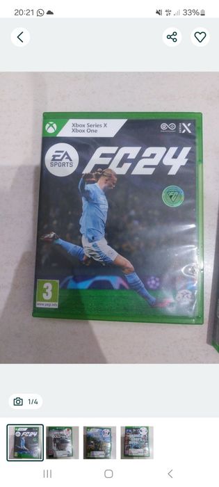 Xbox One com 2 comandos. Vermelho e branco e 6 jogos fifa 26