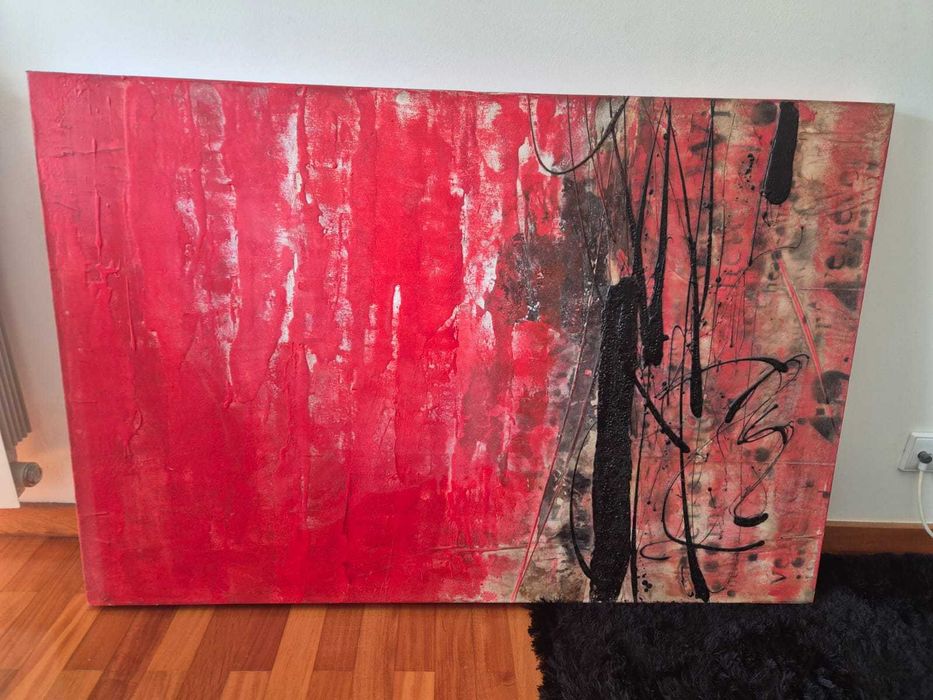 Quadro abstrato em tons de vermelho e preto