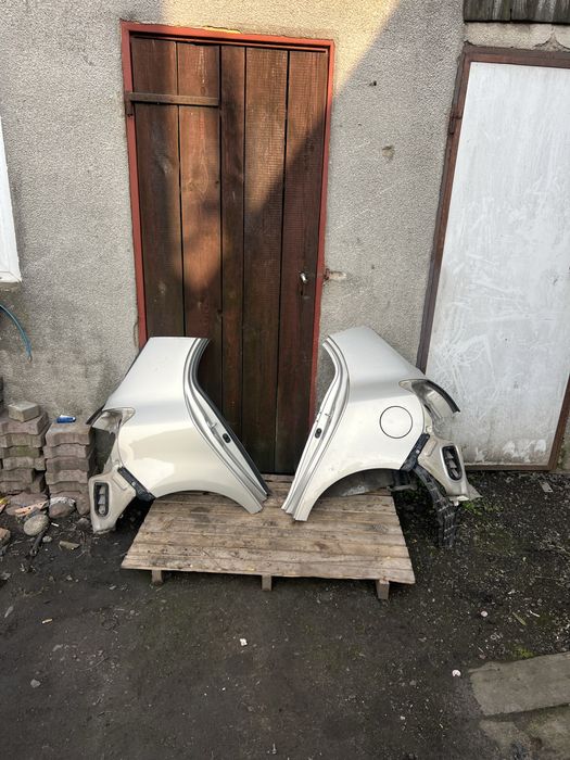 Błotnik ćwiartka prawa lewa tył tylna poszycie toyota yaris II 2 5a7