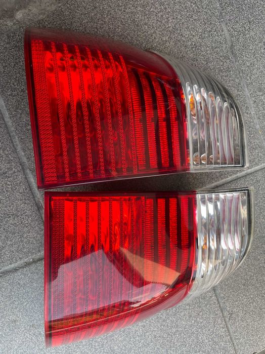Bmw 5 e39 kombi lift lampa prawy lewy tył HELLA biały kierunek komplet