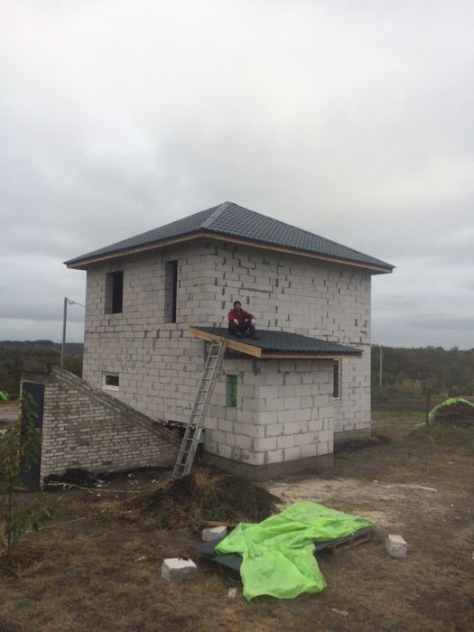 Виконую кирпичьну кладку кровля битоні роботи