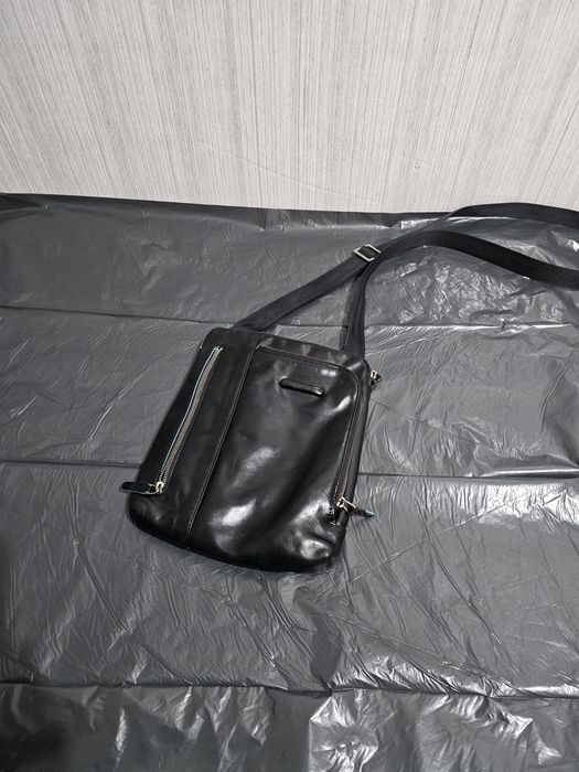 Шкіряна сумка Piquadro та Timberland