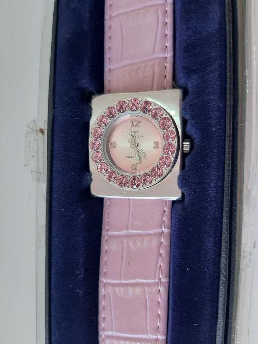 Relogio rosa circular