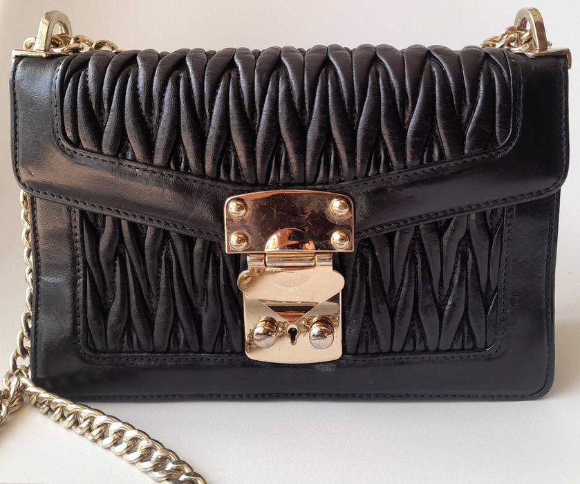 Mala Miu Miu muito bom