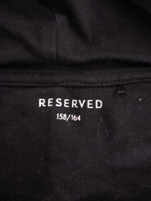 Kombinezon Reserved