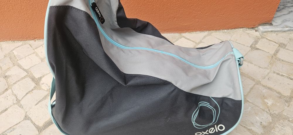 Conjunto.de Patins, proteções, e saco de transporte Oxelo.