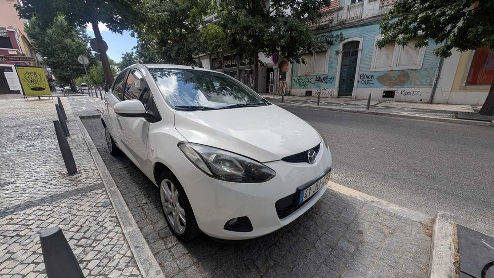 Mazda 2 1.3 gasolina +-211 mil KMS com AC 2010