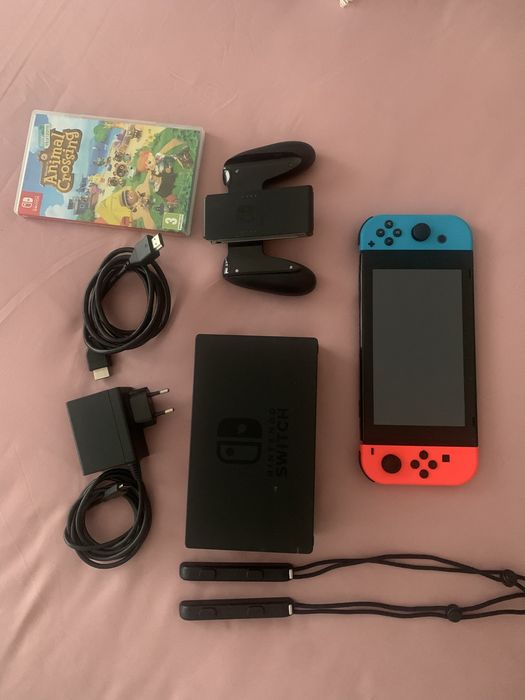 Nintendo Switch Vermelho/Azul Joy-Con c/Jogo Animal Crossing