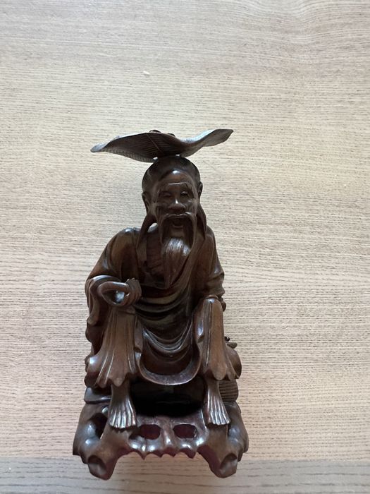 Boneco chines madeira