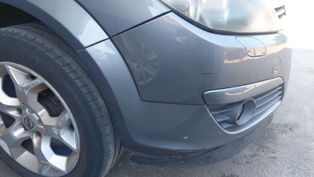 Pára-choques frente OPEL Astra H Caravan (L35)