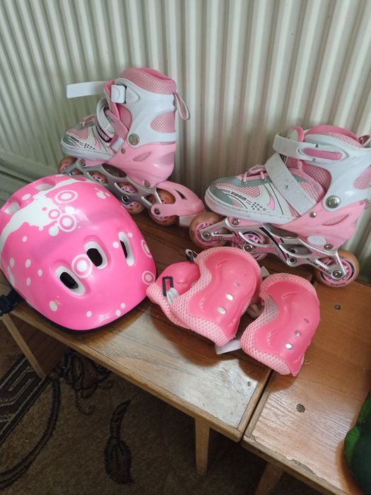 Ролики дівочі б/у