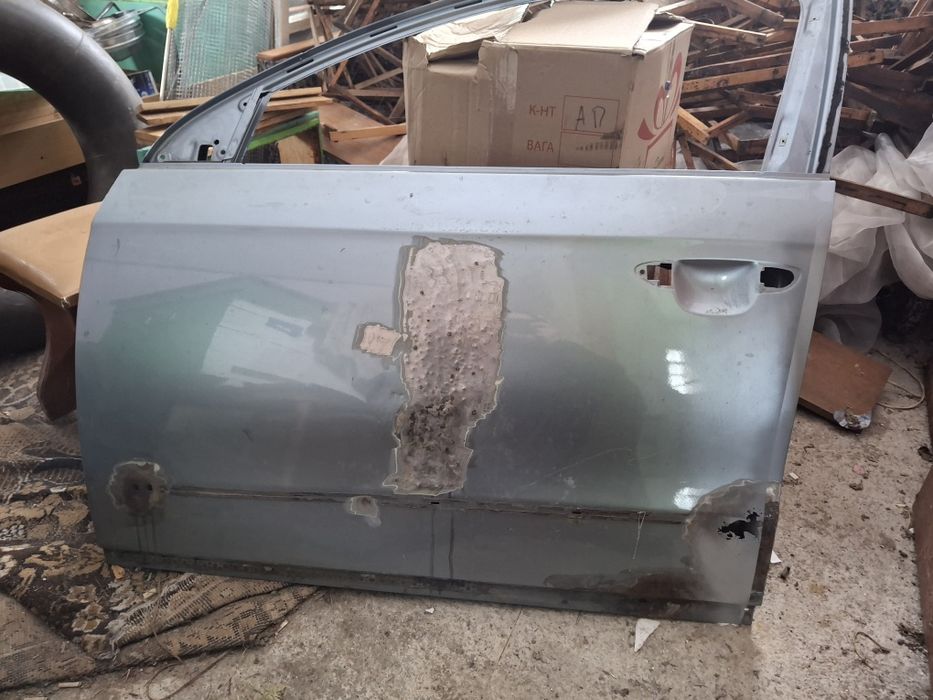 Дверка та крило пассат б6