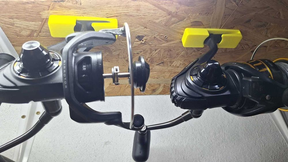 Suporte de parede para carreto de pesca