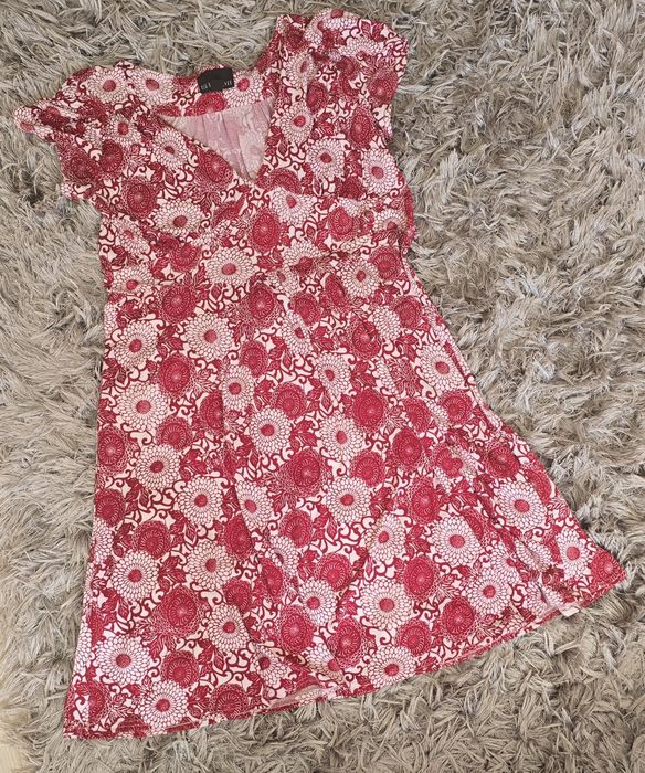 Modna bluzka w kwiatki rom.54