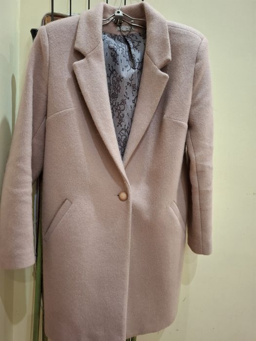 Пудрово-рожеве пальто