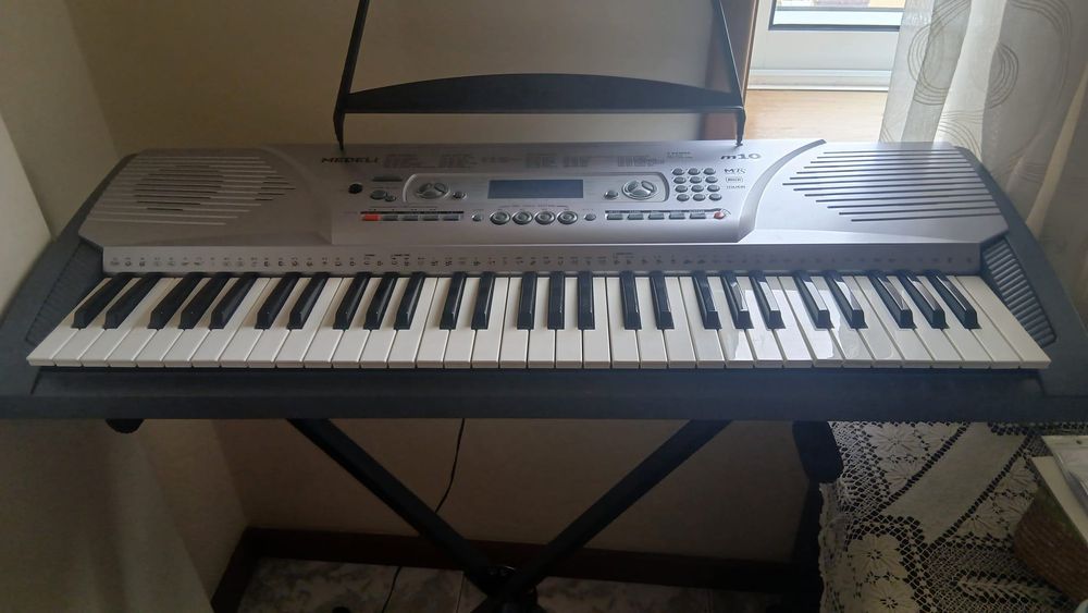 Piano excelente nunca usado