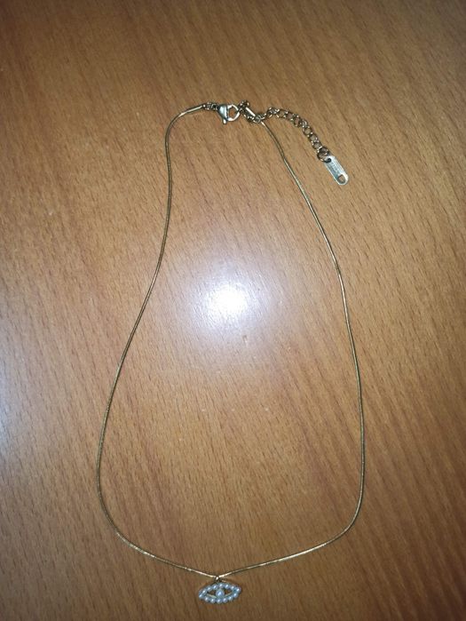 Colar em aço olho turco  com pérolas NOVO