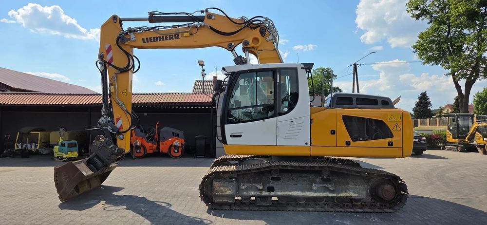 Liebherr <<Liebherr R918, 2014 rok, ramie 3x łamane, oilquick, z Niemiec!>>>>  << Liebherr R918, 2014 rok, ramie 3x łamane, Oilquick, z Niemiec! >>