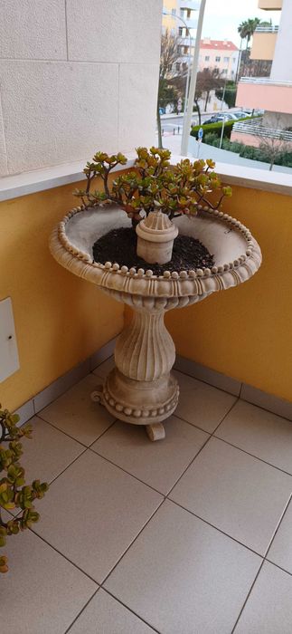 floreira circular exterior em pedra