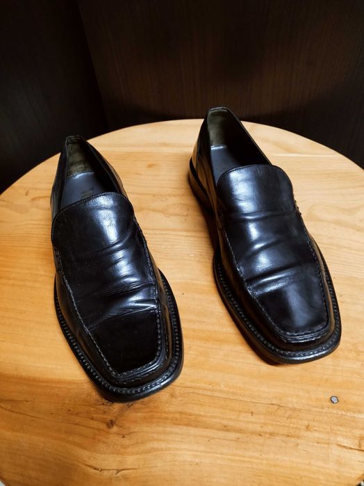 Sapatos de pele preta