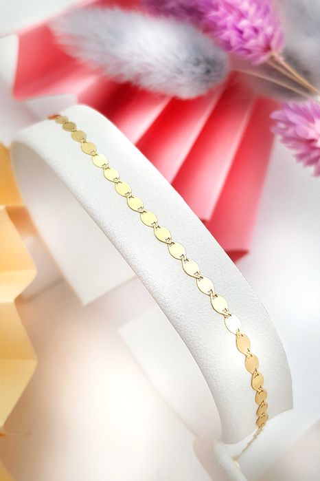 Złota bransoletka z owalnymi, błyszczącymi blaszkami 18 cm pr. 585