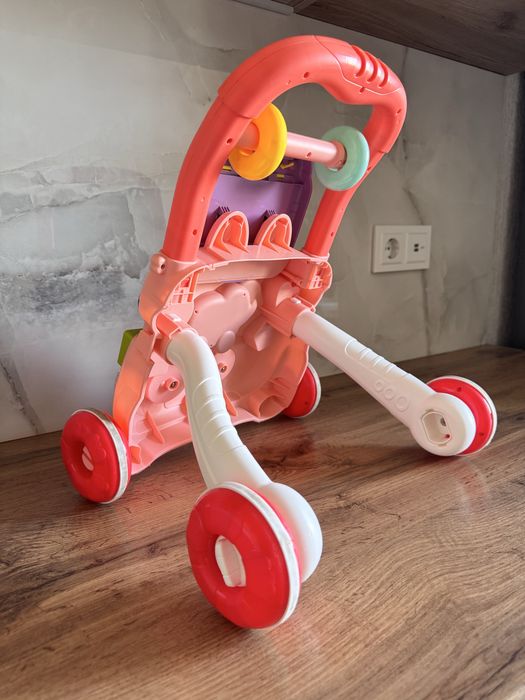 Дитяча каталка ходунки