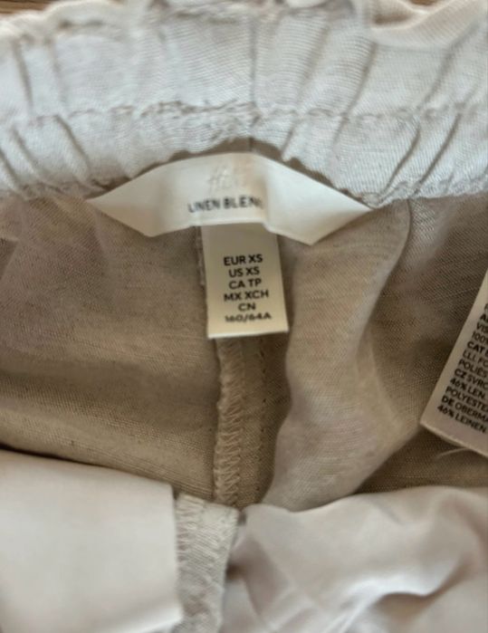 Lniane beżowe spodnie h&m