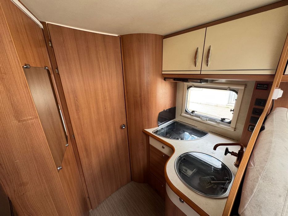 Rapido perfilada Cama central c/ Suite