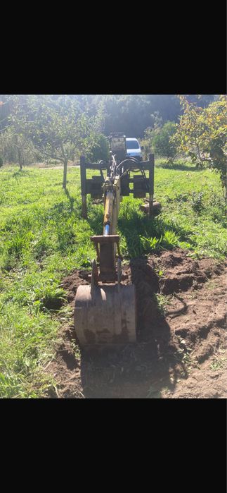 Braço retro para trator