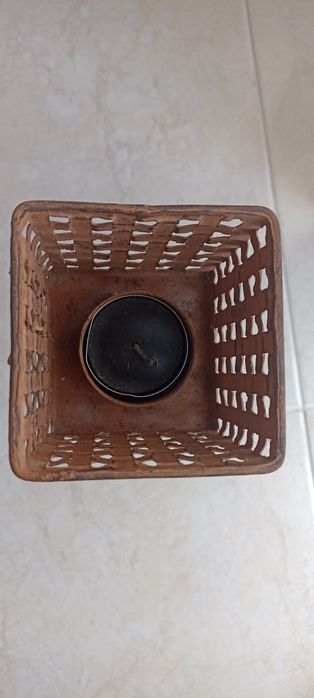 Porta velas com vela