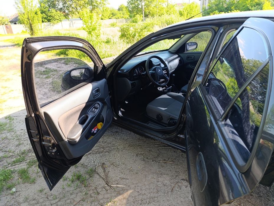 Nissan Almera 2005 VIN SJNBBAN16U2659400 фото оголошення 11 з 18