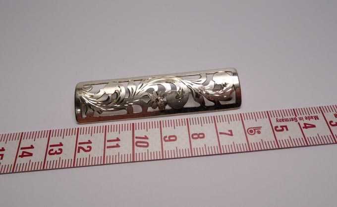 Srebrna broszka wycinane kwiaty handarbeit.