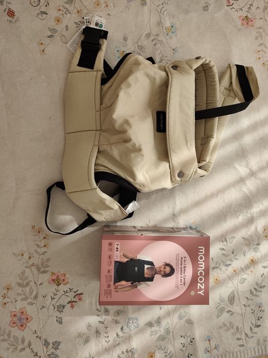 Momcozy porta-bebes Novo