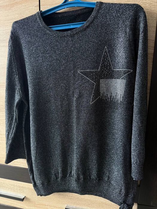 Одяг для жінки .