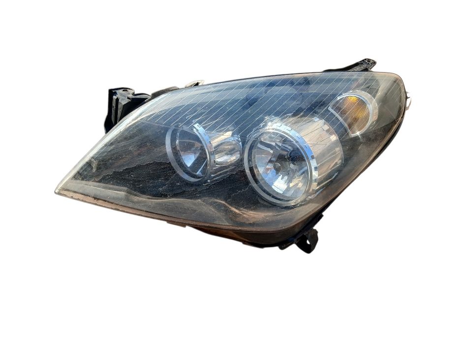 Lampa przód lewa Opel Astra H EUROPA Kompletna