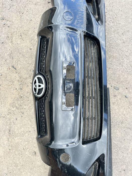 Передній бампер Toyota Auris E150 Тойота Ауріс Е150 2007-2009