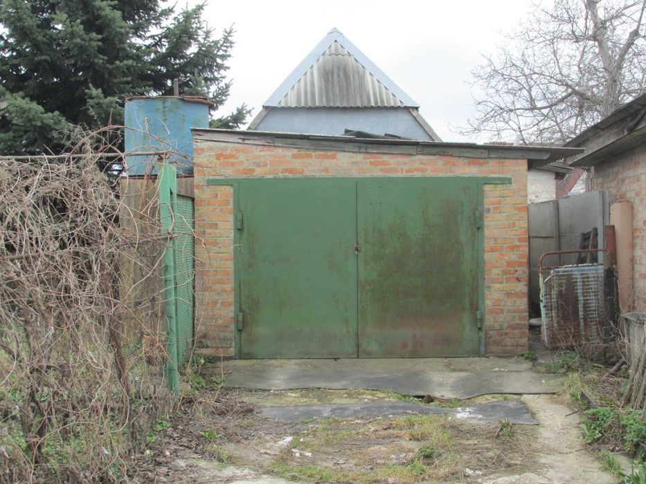 Продам частину будинку по вул. Тітова ( район Дитячої лікарні)