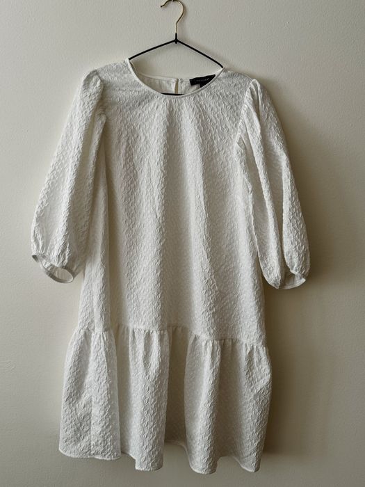 Túnica branca os desenhos