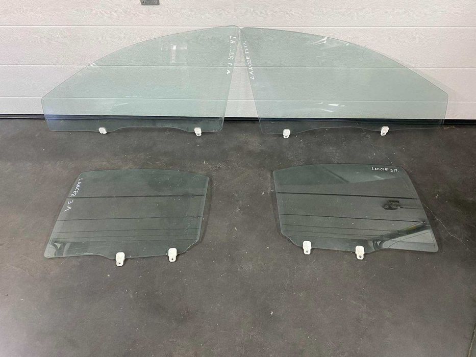 Скло стекло дверей заднє переднє Mitsubishi Lancer X 07-14р.