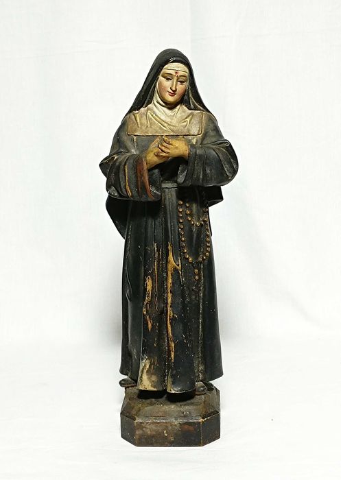 Santa Rita em madeira