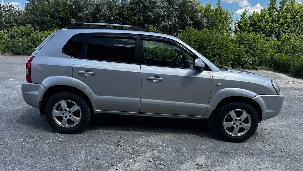 Hyundai Tucson 2005 VIN KMHJN81BP5U176720 фото оголошення 8 з 24