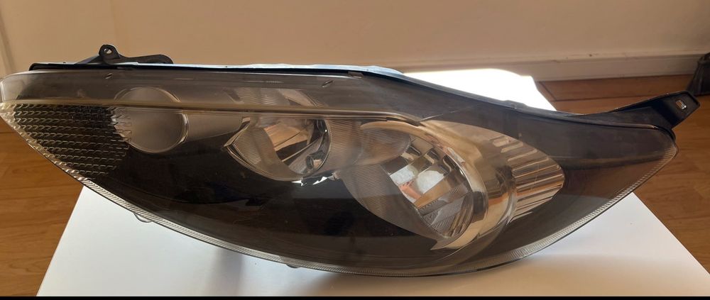 Farol esquerdo Ford Fiesta ref. 1FJ247045-01