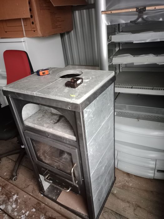 Камін на дрова.Буржуйки