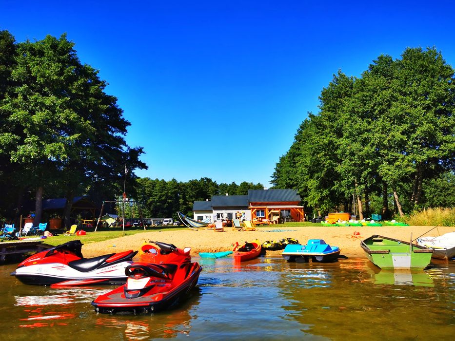 Domki CAŁOROCZNE nad jeziorem -BALIA z Jacuzzi, PLAŻA, Pomost, SAUNA