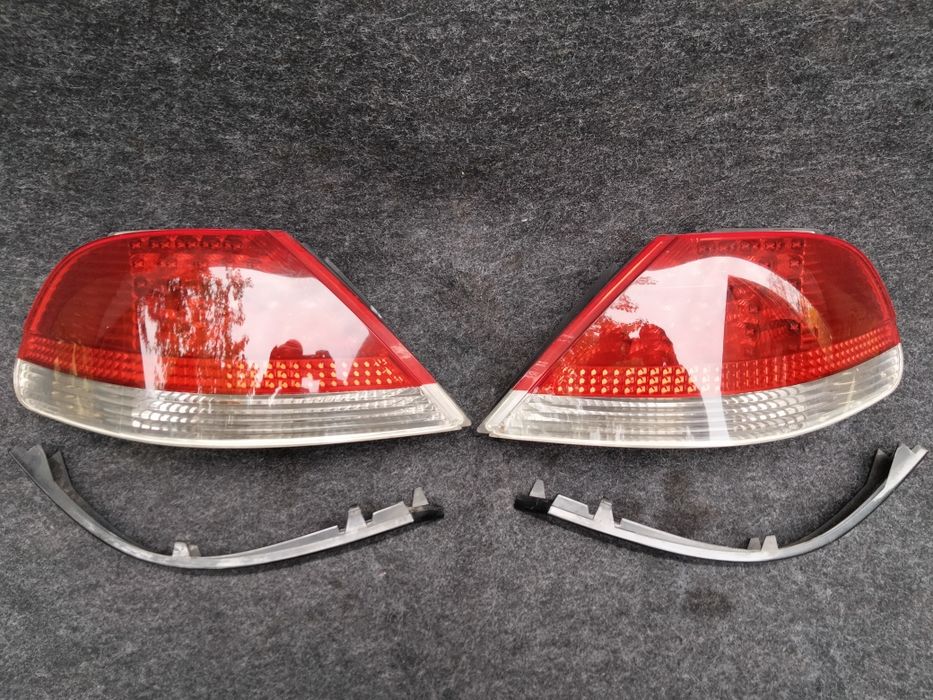 BMW E 65 lampa tył tylna listwa pod lampę L/P Europa