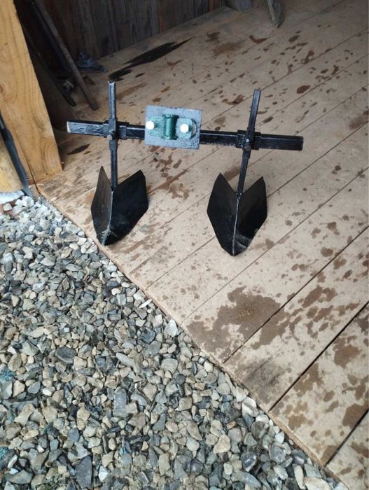 Плуги (марка) до мотоблока