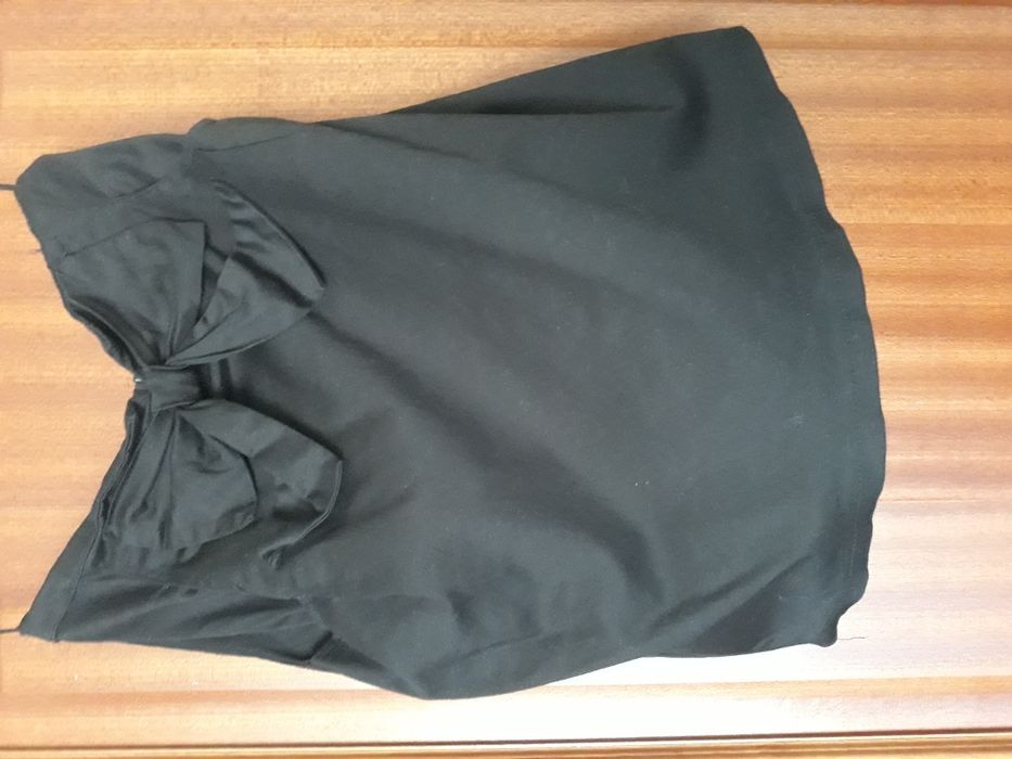 Saia preta com laço