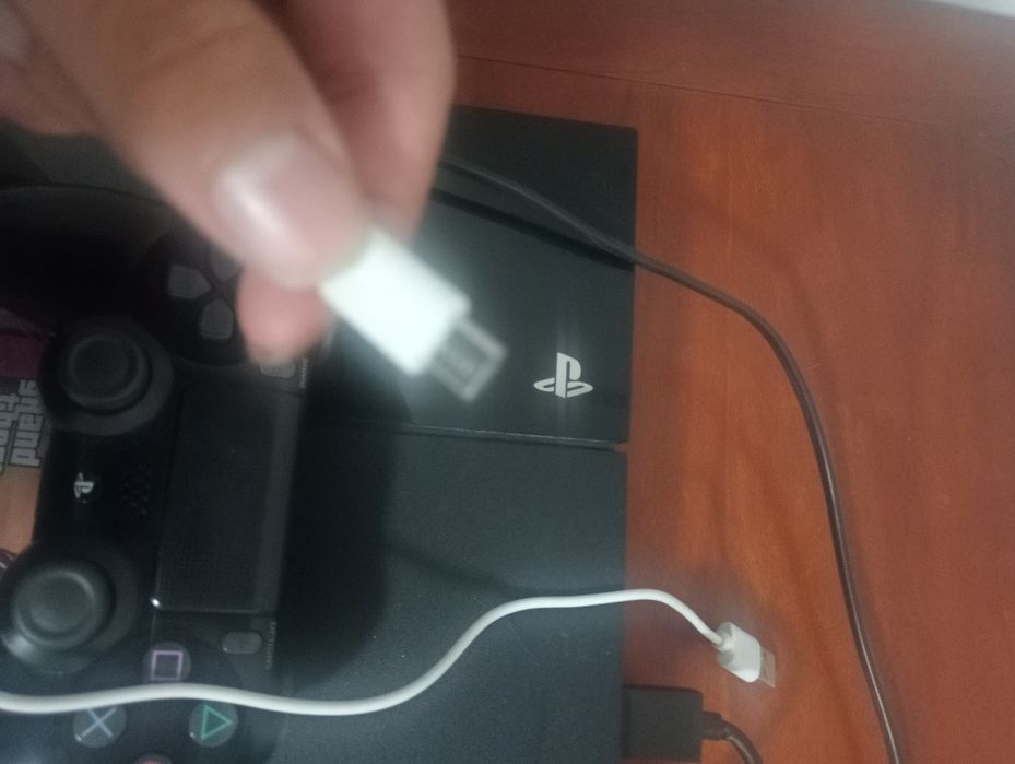 PS4 comes with the charger and the GTA game, and it is in good condition64171745510145121